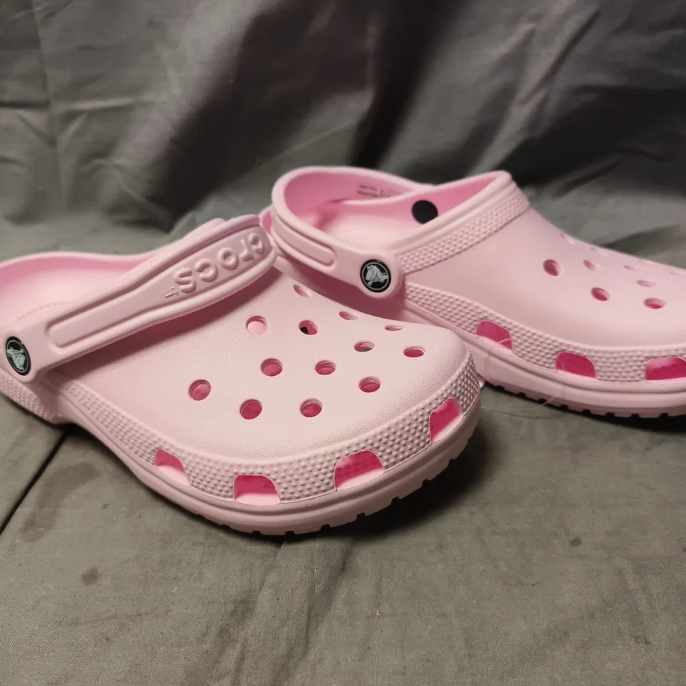 PAIR OF CROCS CLASSIC CLOGS IN PINK SIZE UK M4/W5