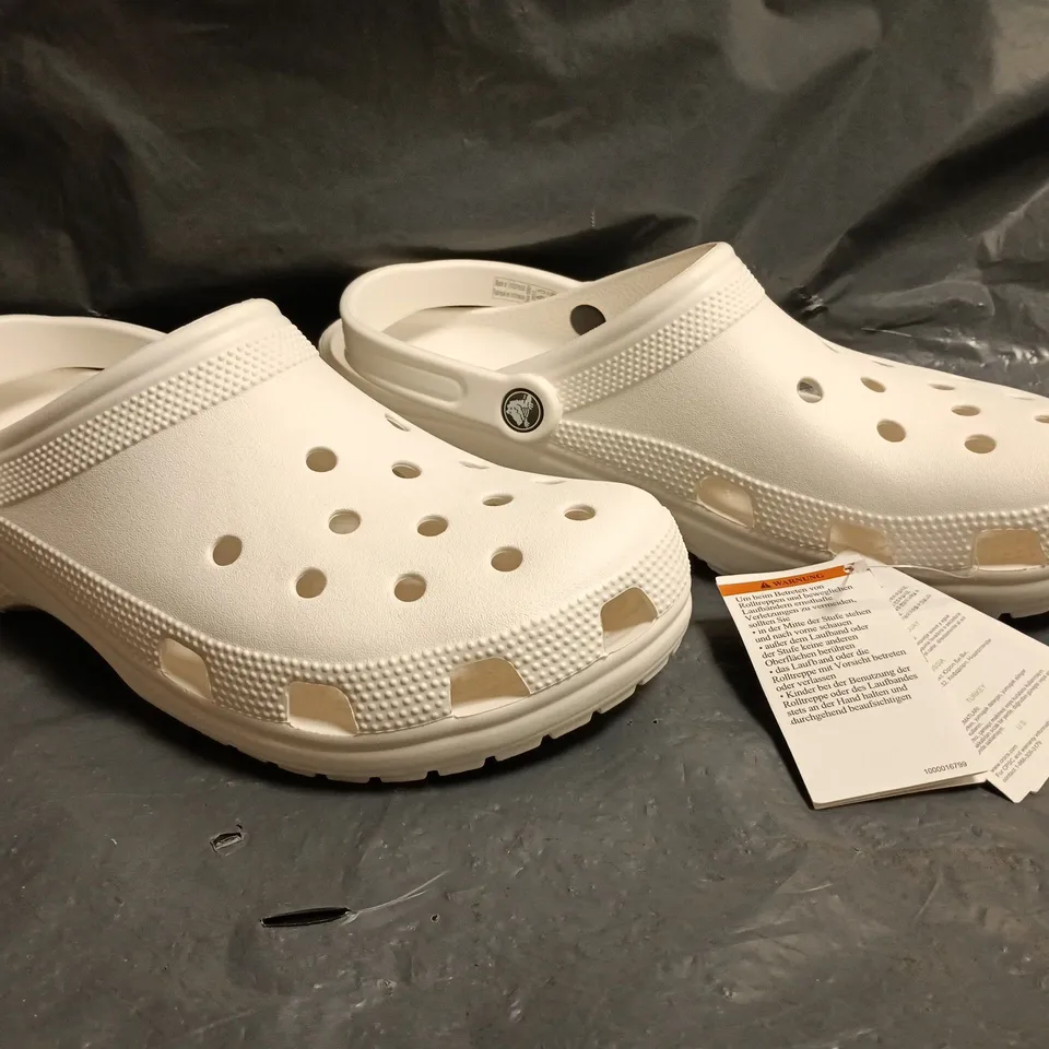 PAIR OF CROCS CLASSIC CLOGS IN WHITE SIZE UK M11/W12