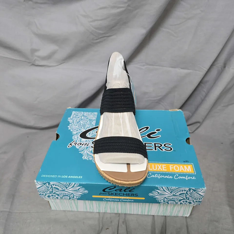 BOXED PAIR OF SKECHERS BEVERLEE SHEER LUCK SANDALS IN BLACK - UK 8