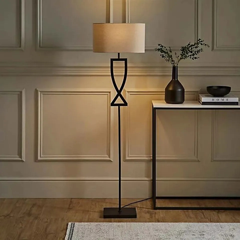 BOXED VALUELIGHTS KATNISS LARGE BLACK METAL FLOOR LAMP WITH AN OATMEAL FABRIC OVAL LAMPSHADE