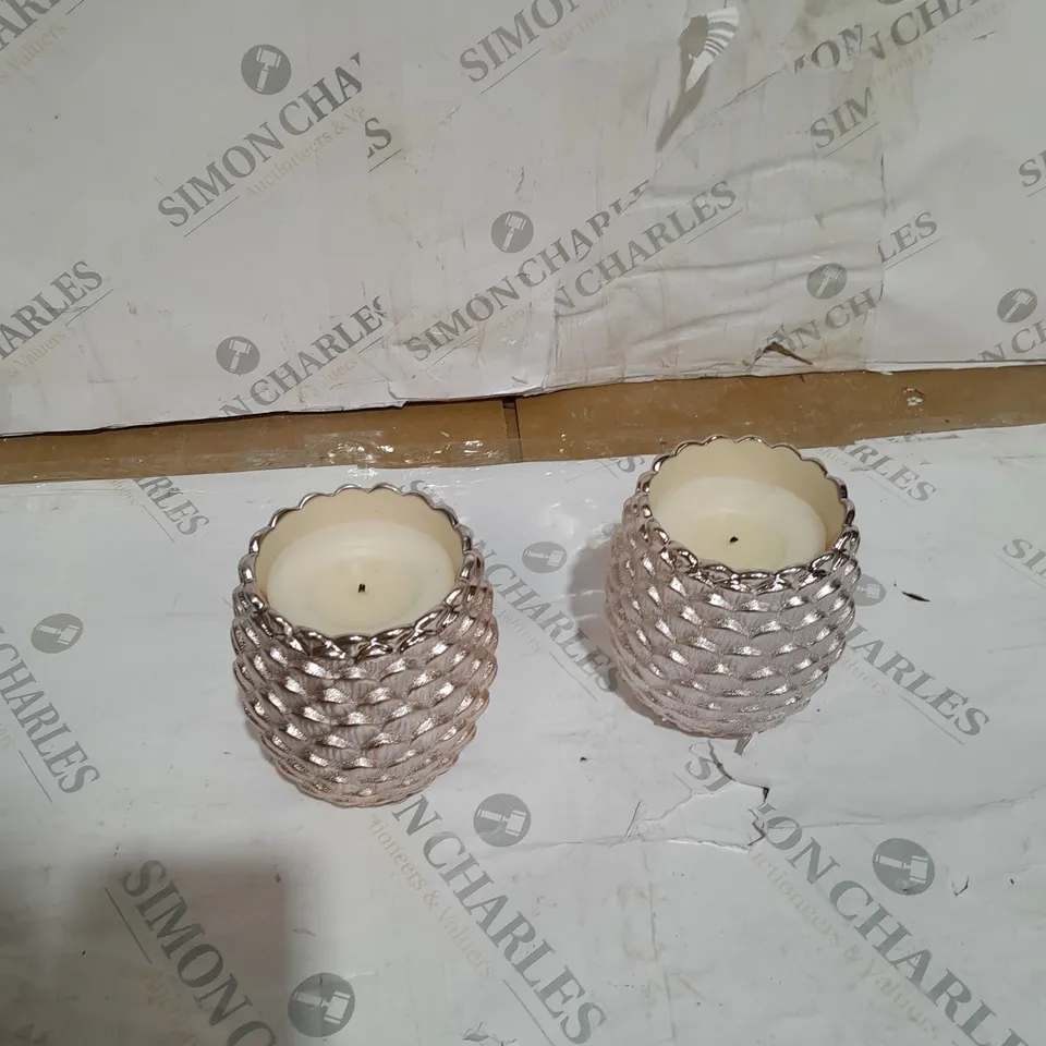 BOXED HOMEWORX BY HARRY SLATKIN PAIR OF AUTUMN PINECONE SCENTED CANDLES IN ROSE GOLD COLOUR