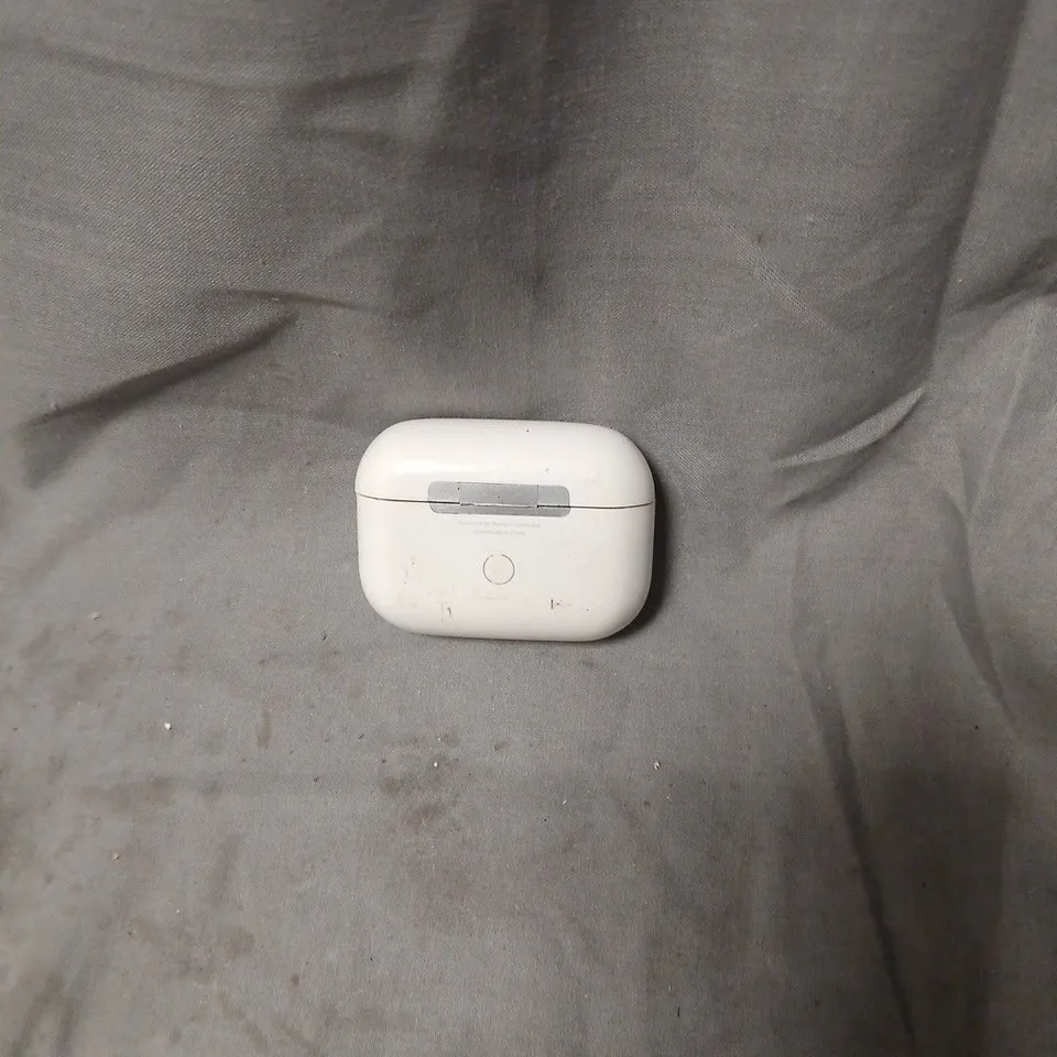 WHITE WIRELESS EARBUDS WITH CHARGING CASE. MODEL UNSPECIFIED.
