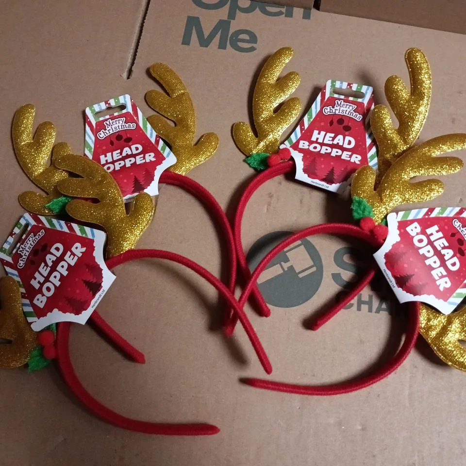 LOT OF APPROXIMATELY 70 MERRY CHRISTMAS HEAD BOPPERS