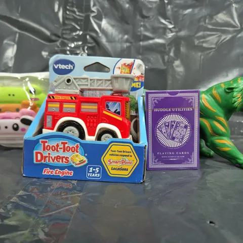 APPROXIMATELY 12 ASSORTED TOYS AND GAMES TO INCLUDE VETCH TOOT-TOOT DRIVERS FIRE ENGINE, PLAYING CARDS, ETC