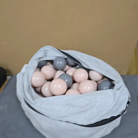 PASTEL PINK AND GREY PLAY BALLS IN FABRIC DRAWSTRING BAG