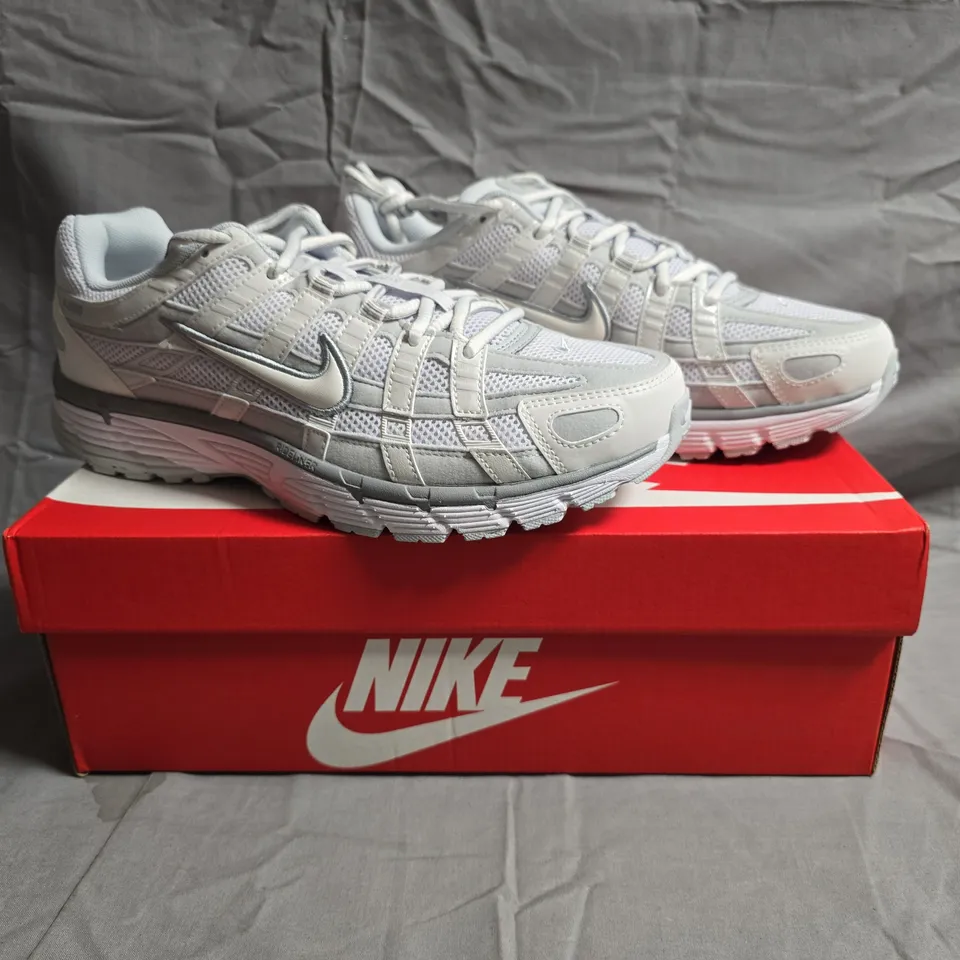 BOXED PAIR OF NIKE WOMENS P-6000 TRAINERS IN WHITE SIZE UK 8