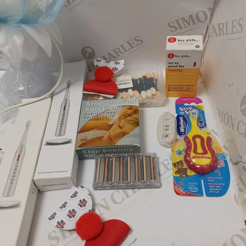 LOT OF APPROX 12 TO INCLUDE SONIC TOOTHBRUSH , STOP SNORING SOLUTION AND TAMPONS