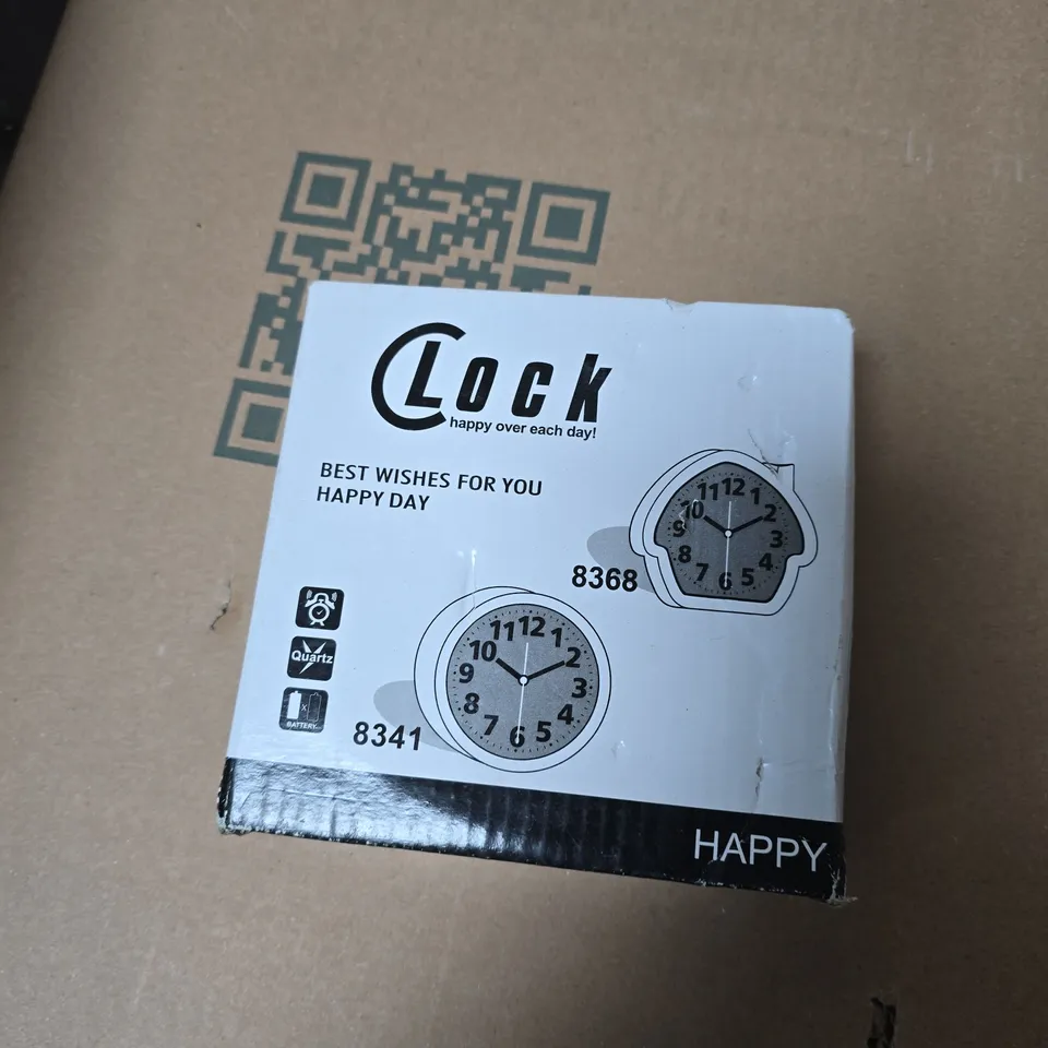 BOX OF APPROXIMATELY 25 ASSORTED ITEMS INCLUDING MOBILE PHONE HOLDER 3D PUZZLE AND HAPPY CLOCK 