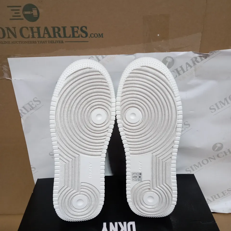 BOXED PAIR OF DKNY MADIGAN SLIP ON TRAINERS SIZE 6