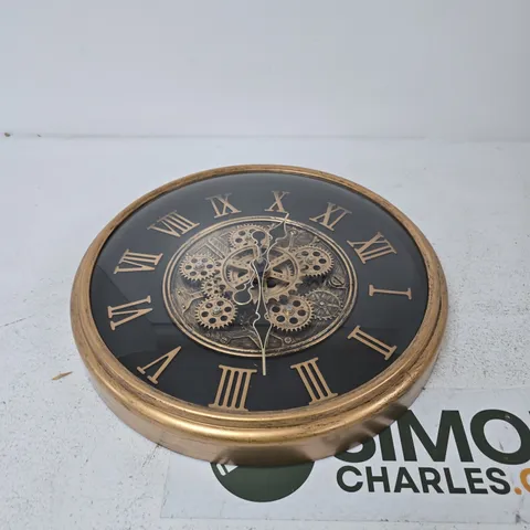 BRASS-EFFECT SKELETON GEAR WALL CLOCK WITH ROMAN NUMERALS