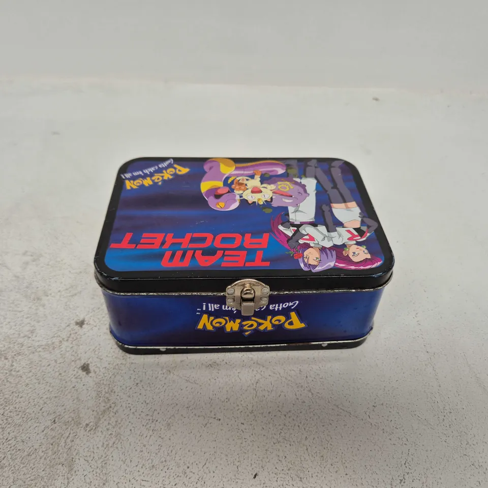 POKEMON TEAM ROCKET TIN WITH ASSORTMENT OF POKEMON CARDS