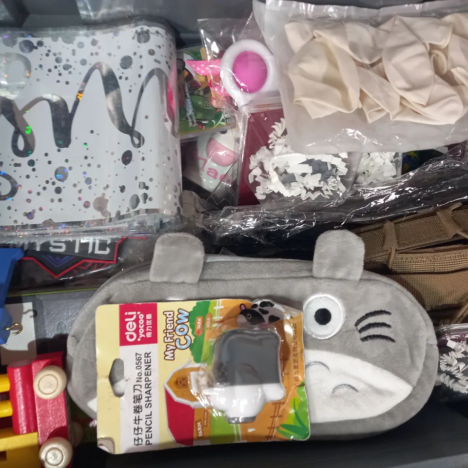LOT OF APPROXIMATELY 10 ASSORTED TOYS AND GAMES TO INCLUDE YOGA POSES, STRESS BALL, FART WHISTLE, ETC