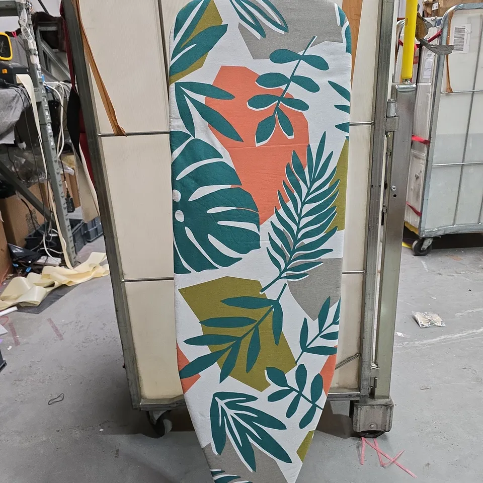 IRONING BOARD WITH TROPICAL LEAF-PATTERN COVER ON METAL FOLDING FRAME