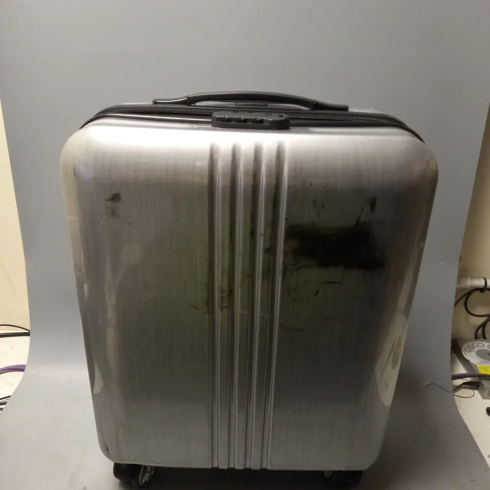 UNBRANDED PLASTIC SILVER CARRY ON CASE WITH 4 WHEELS 