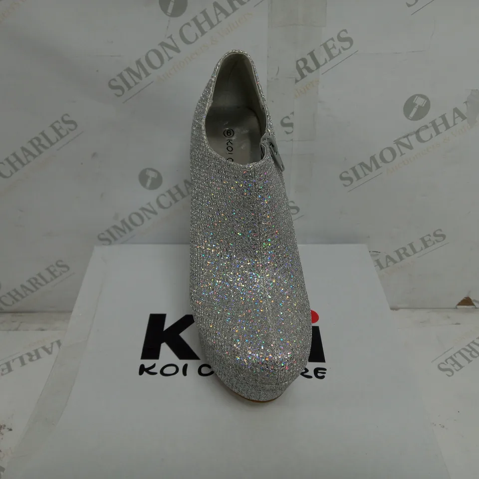 APPROXIMATELY 10 BRAND NEW BOXED PAIRS OF KOI COUTURE PLATFORM SHOES IN SILVER/SHIMMER TO INCLUDE SIZES 4, 5, 6