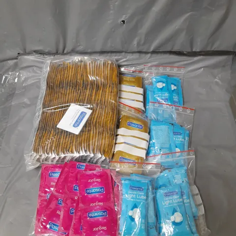 LARGE QUANTITY OF PASANTE CONDOMS ASSORTED SIZES AND LIGHT LUBE SACHETS