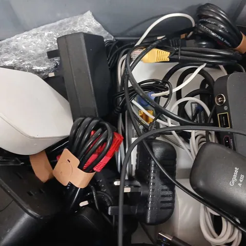 APPROXIMATELY 15 ASSORTED HOUSEHOLD ITEMS TO INCLUDE REMOTES, CABLES, ROUTERS, ETC