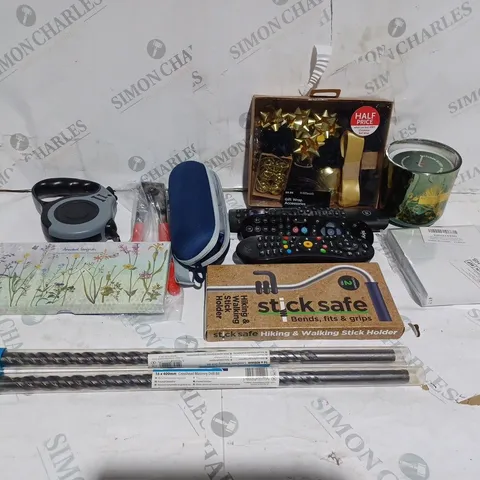 LOT OF APPROXIMATELY 10 ASSORTED HOUSEHOLD ITEMS TO INCLUDE CANDLES, REMOTE CONTROLS AND STICK SAFE