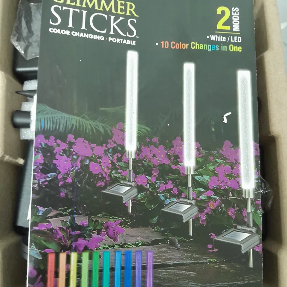 BOXED BELL & HOWELL GLIMMER STICKS SET OF 4 SOLAR PATHWAY LIGHTS
