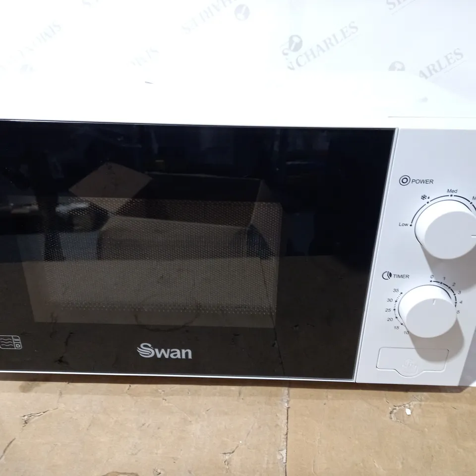 SWAN 700W MANUAL MICROWAVE RRP £108