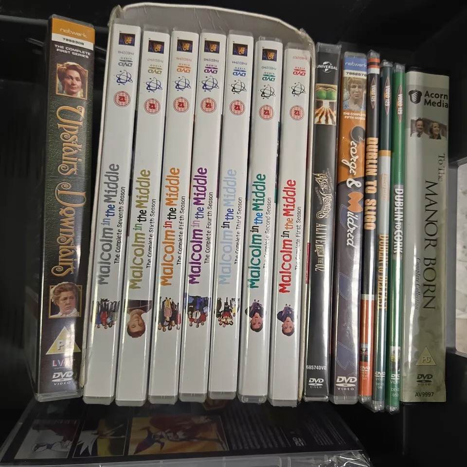 APPROXIMATELY 12 ASSORTED DVDS TO INCLUDE 100 VINTAGE TRACTORS, TREMORS, GHOST IN THE SHELL 2, ETC