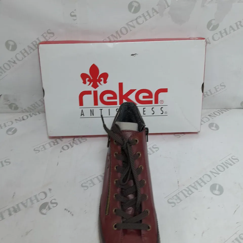 BOXED PAIR OF RIEKER SIDE ZIP WATER RESISTANT BOOTS IN BURGUNDY SIZE 8