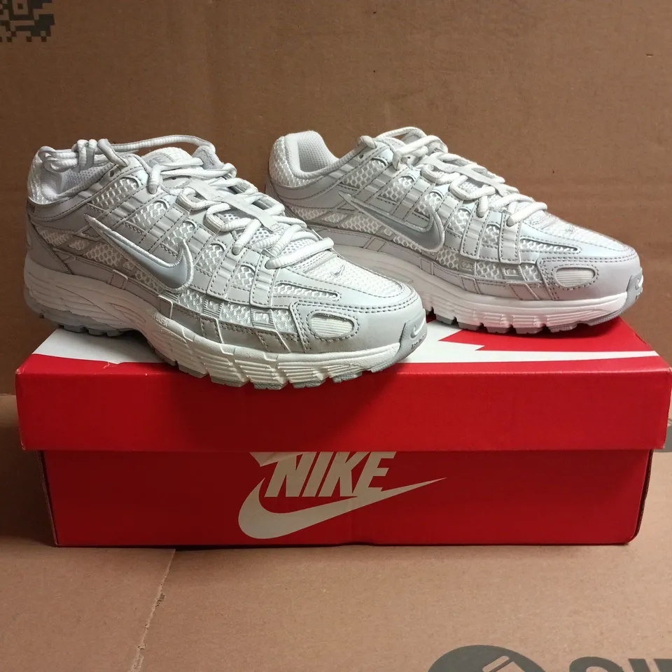 BOXED PAIR OF NIKE P-6000 TRAINERS IN WHITE SIZE UK 4