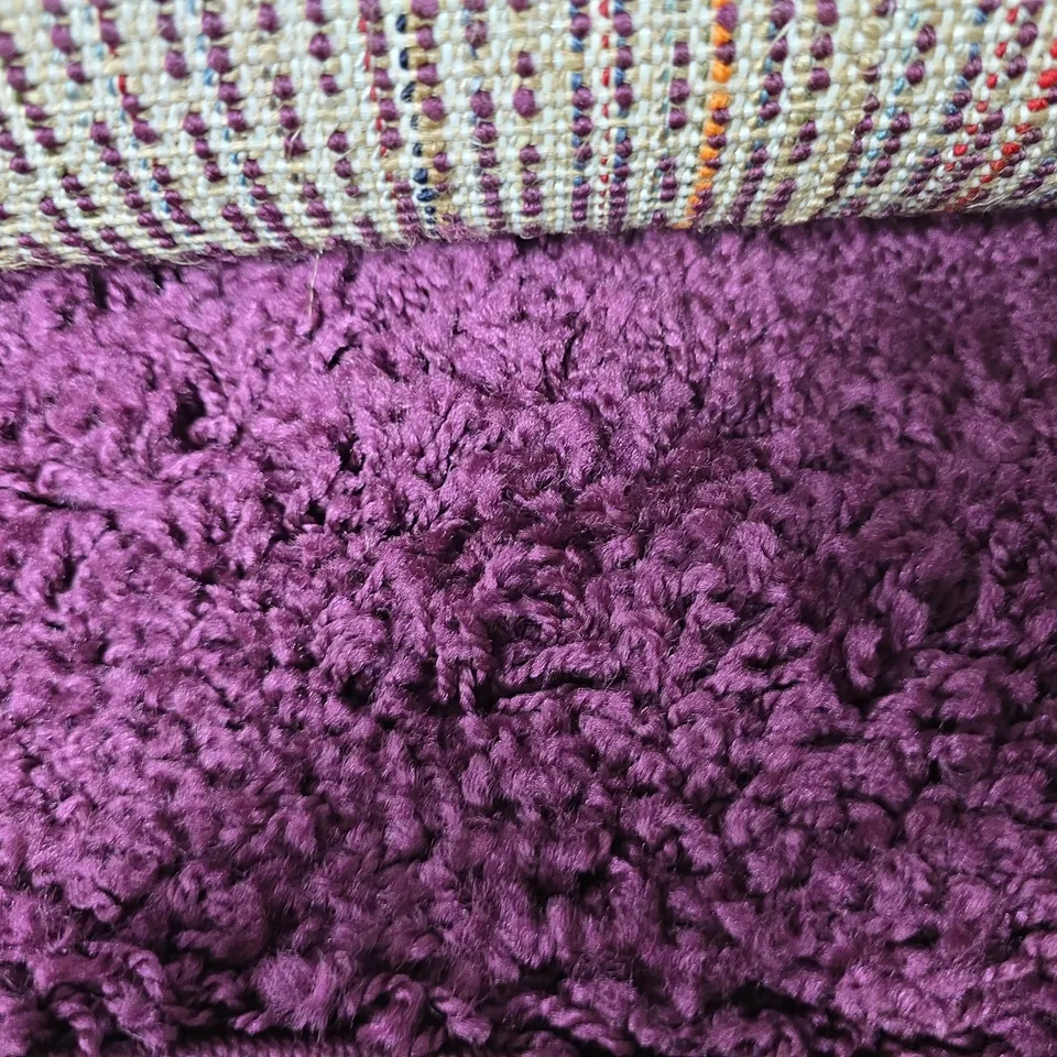  RUG WITH PURPLE SHAG EFFECT - WIDTH 80CM LENGTH UNSPECIFIED 
