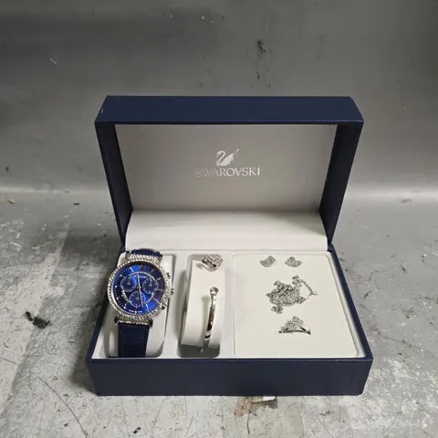 BOXED SWAROVSKI GIFT SET BOX TO INCLUDE - NAVY WATCH , EARRINGS , BANGLE ETC