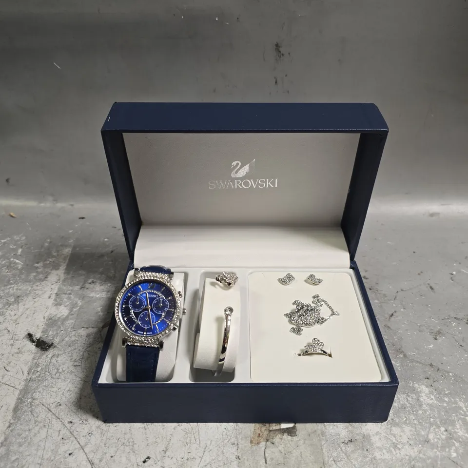 BOXED SWAROVSKI GIFT SET BOX TO INCLUDE - NAVY WATCH , EARRINGS , BANGLE ETC