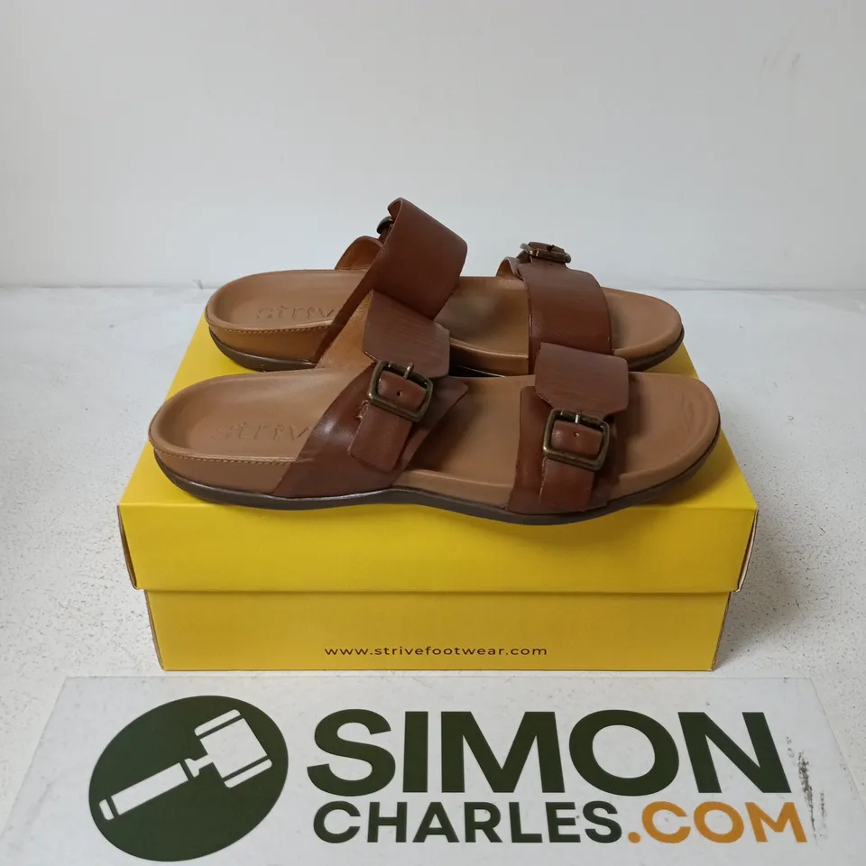 BOXED PAIR OF STRIVE CAPRERA TAN SANDALS - UK 7