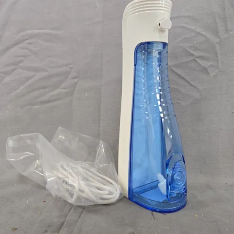 LEOMINOR PORTABLE ORAL IRRIGATOR