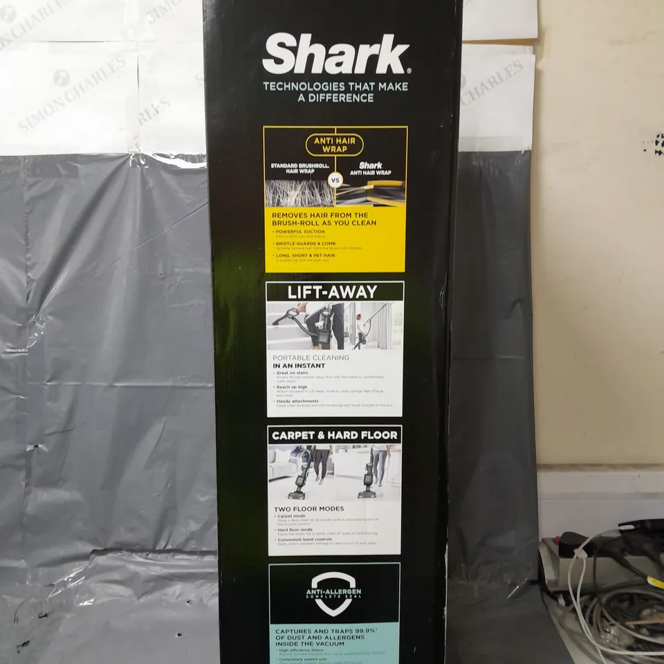 BOXED SHARK UPRIGHT CORDED VACUUM WITH ANTI-HAIR WRAP, LIFTAWAY TECHNOLOGY AND COMPLETE SEAL NZ690UK RRP £249