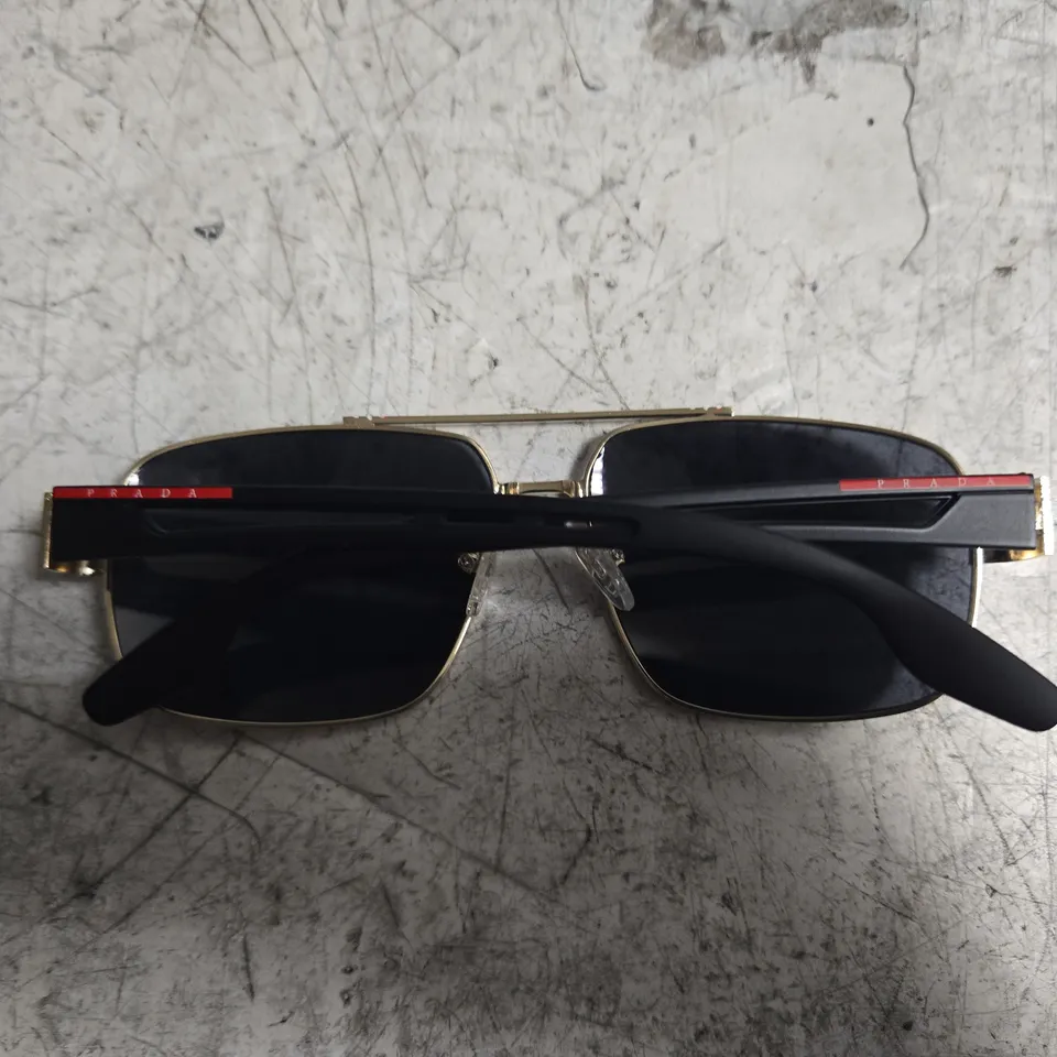 BOXED PAIR OF PRADA SUNGLASSES