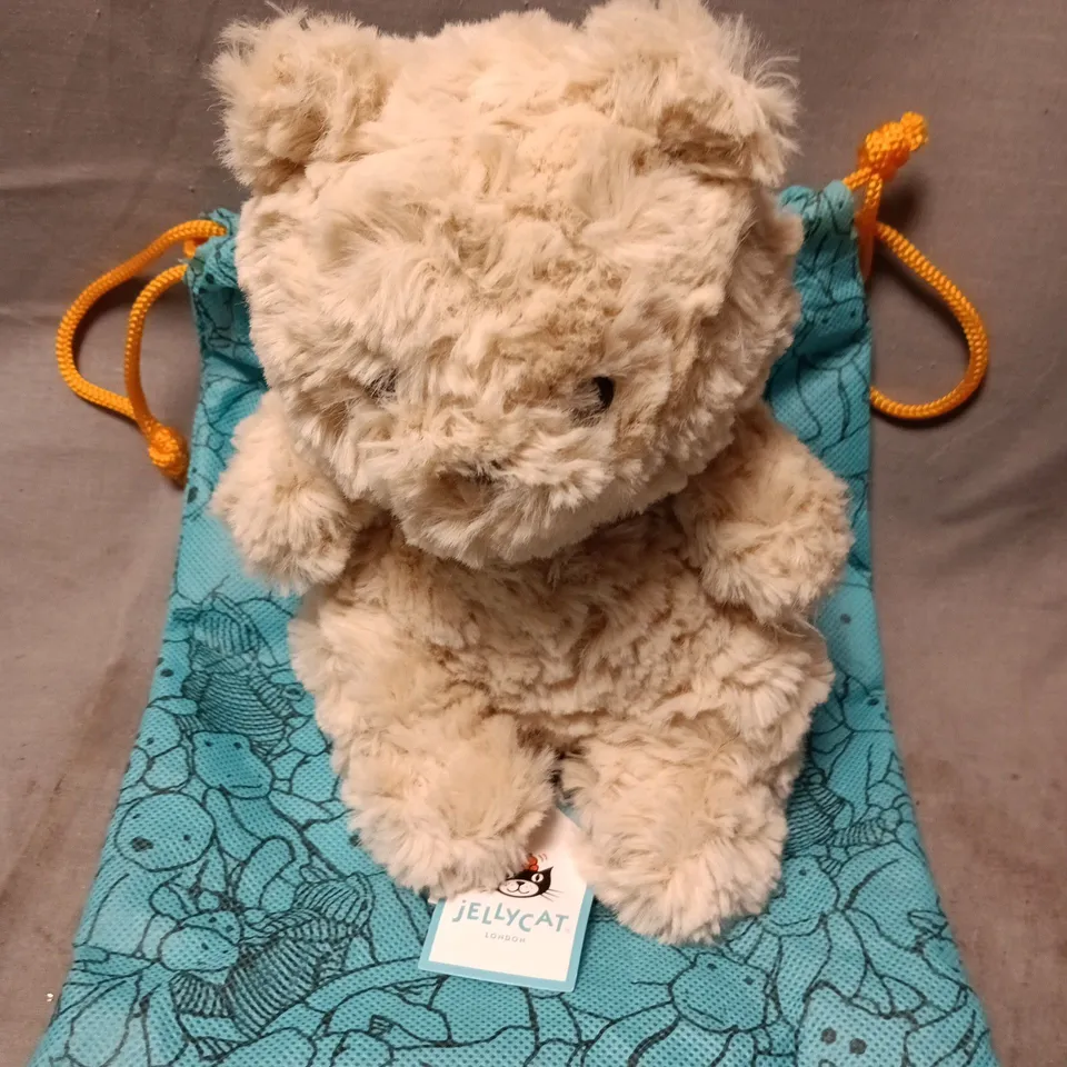JELLYCAT LONDON BEIGE BEAR PLUSH – WITH TURQUOISE DRAWSTRING BAG