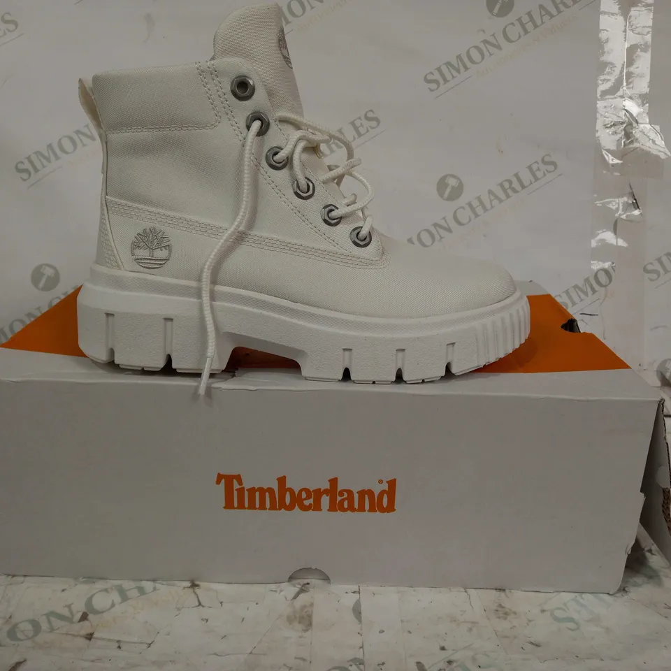 BOXED PAIR OF TIMBERLAND GREYFIELD CANVAS BOOTS IN WHITE UK SIZE 4