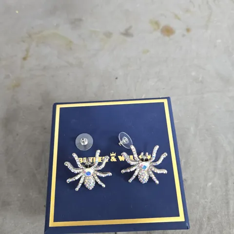 BUTLER & WILSON CRYSTAL STARBURST STUD EARRINGS WITH BLUE CENTRE STONE