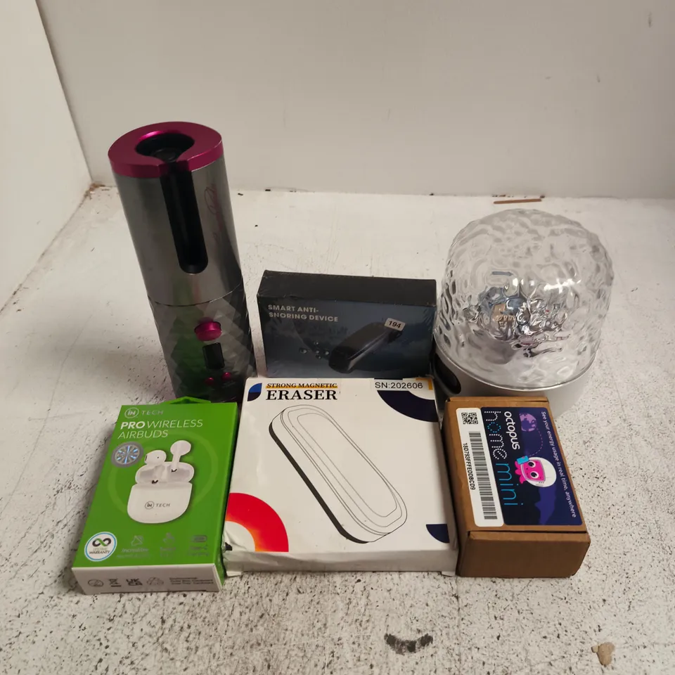 APPROXIMATELY 12 ASSORTED ELECTRICAL ITEMS TO INCLUDE SMART ANTI-SNORING DEVICE, IN TECH PRO WIRELESS AIRBUDS, STRONG MAGNETIC ERASER, ETC