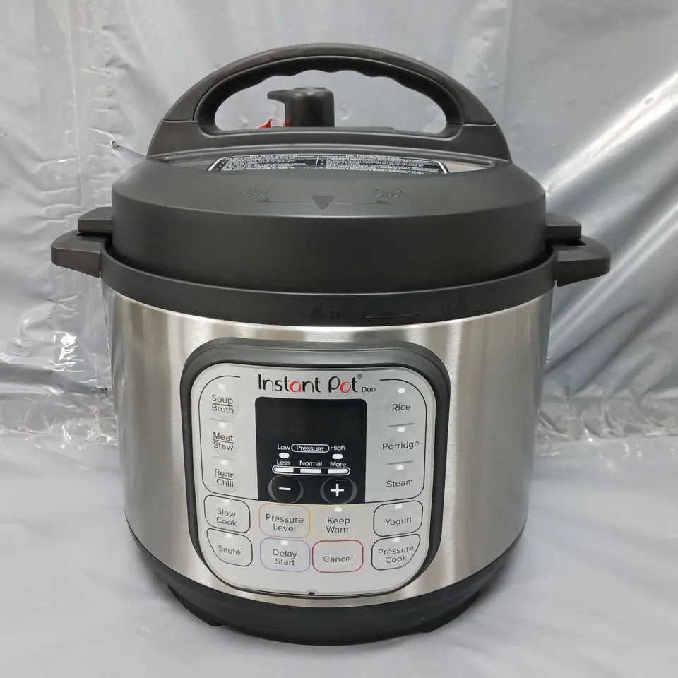 BOXED INSTANT POT DUO MULTI-USE PRESSURE COOKER