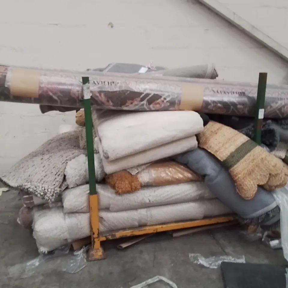 STILLAGE OF APPROXIMATELY 20 QUALITY DESIGNER RUGS