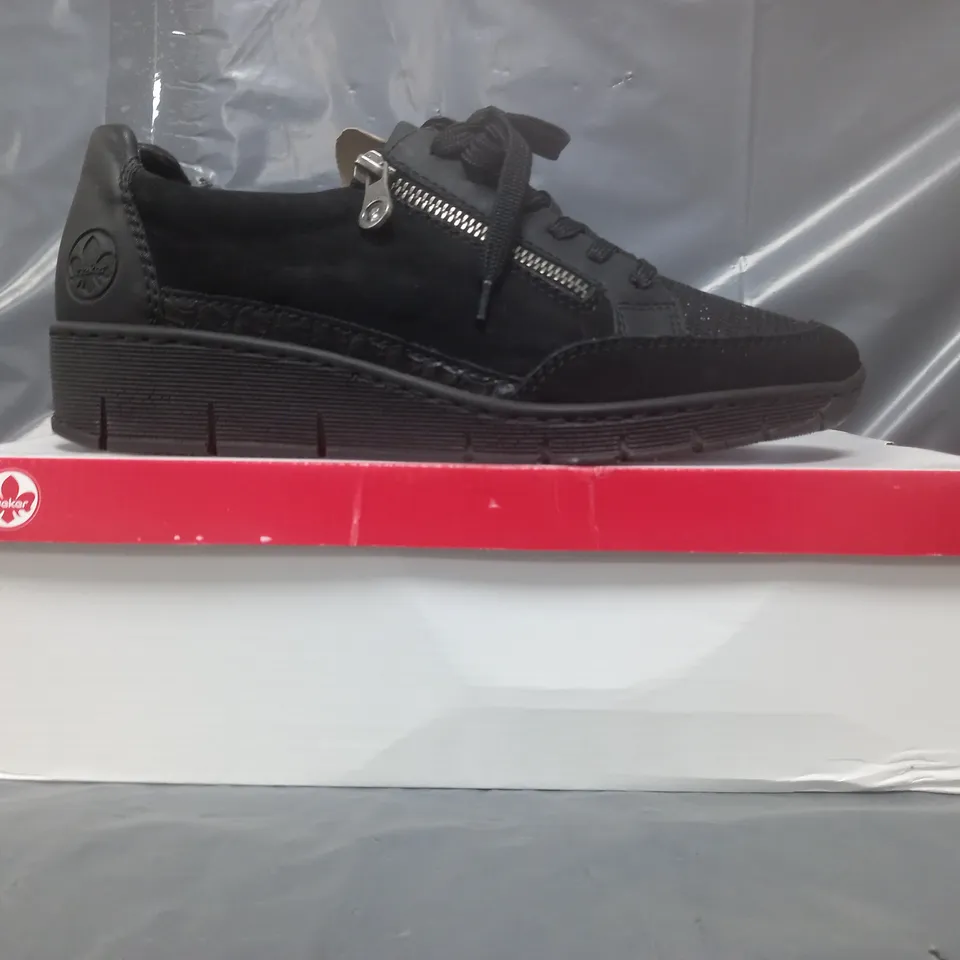 BOXED PAIR OF RIEKER WEDGE TRAINERS IN BLACK SIZE 7.5