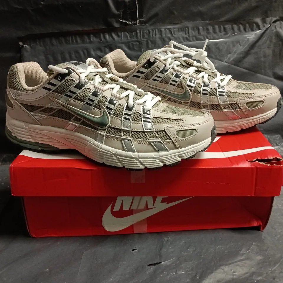 BOXED PAIR OF NIKE P-6000 TRAINERS IN CREAM/CLAY GREEN SIZE UK 11