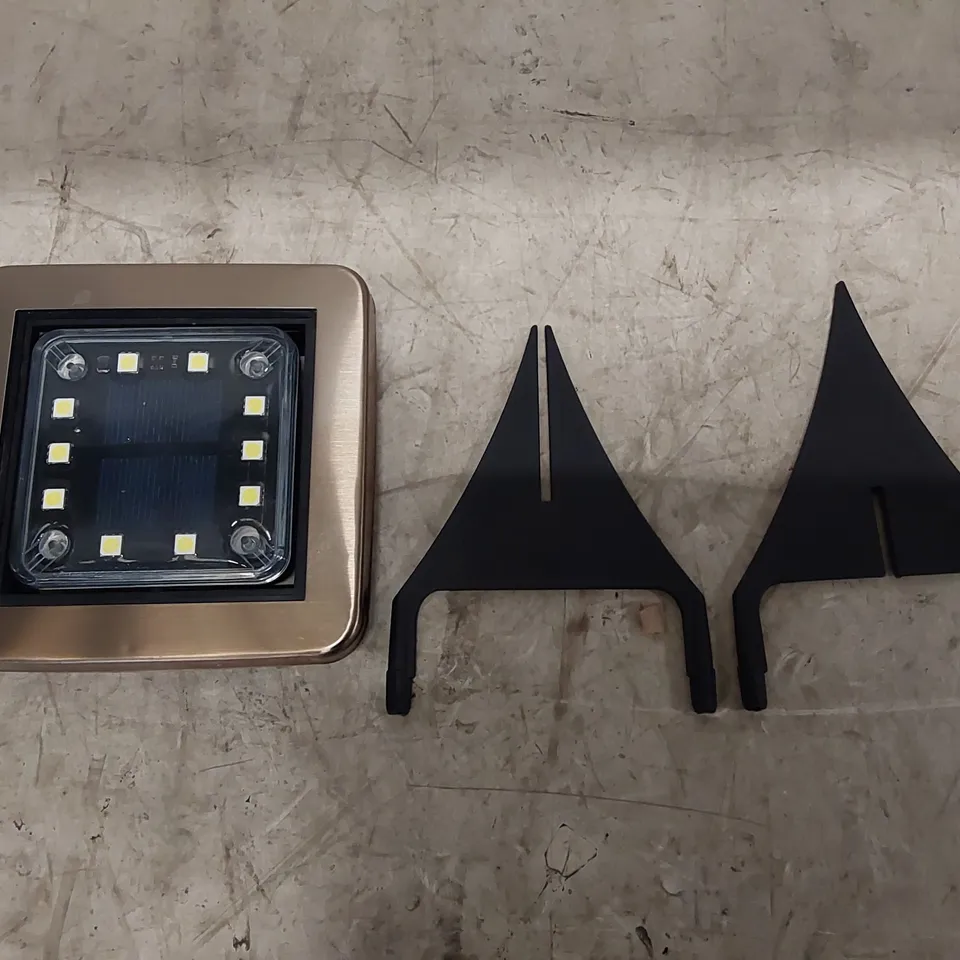 BOXED BELL & HOWELL BRONZE SOLAR PANEL LIGHTS SET OF APPROXIMATELY 8 (1 BOX)