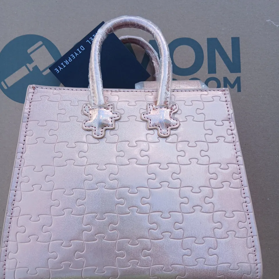 APPROXIMATELY FOUR DANIEL DIYEPRIYE METALLIC PINK HANDBAG