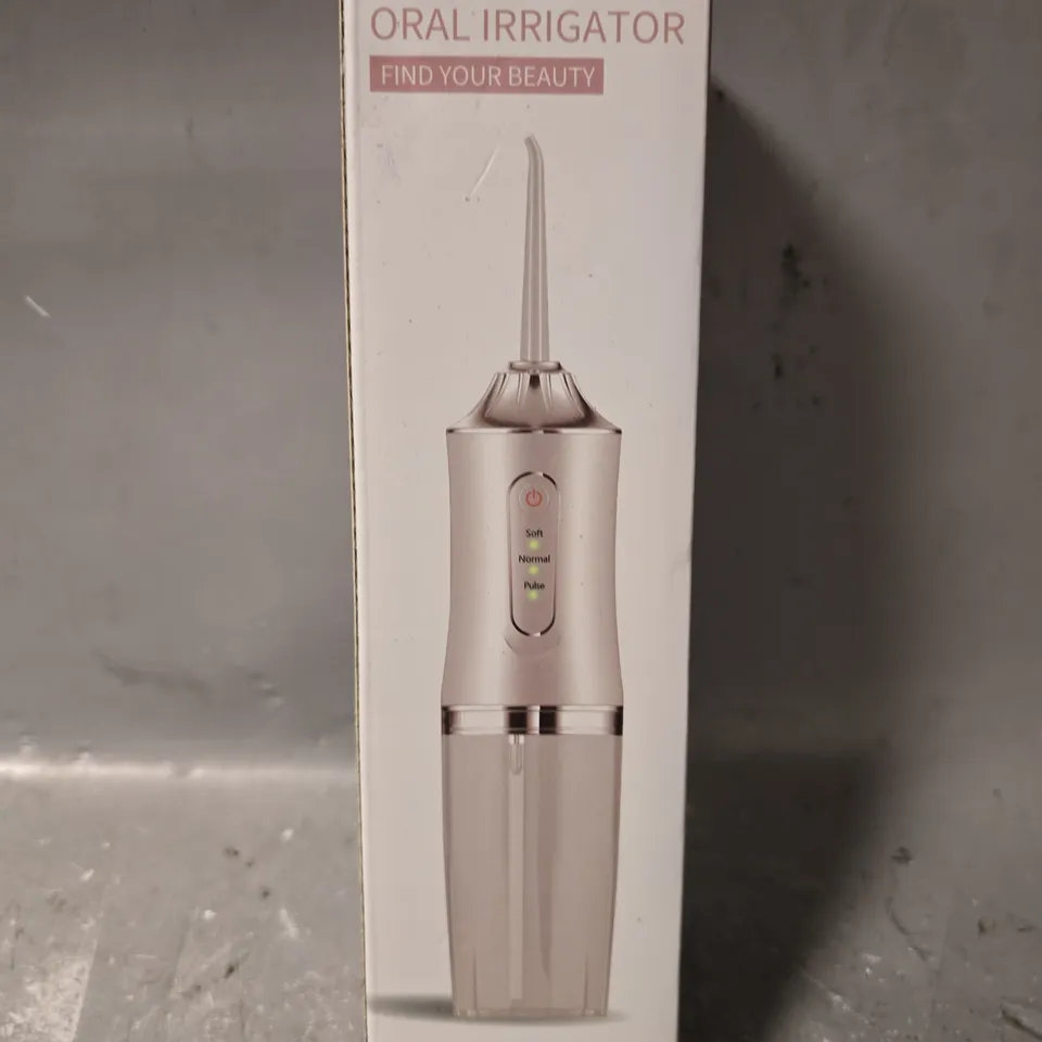 PORTABLE ORAL IRRIGATOR