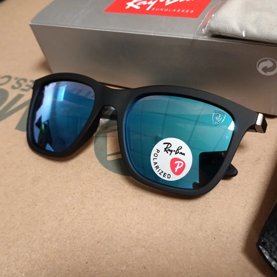BOXED PAIR OF RAY BAN POLARIZED GLASSES WITH BLACK FRAMES