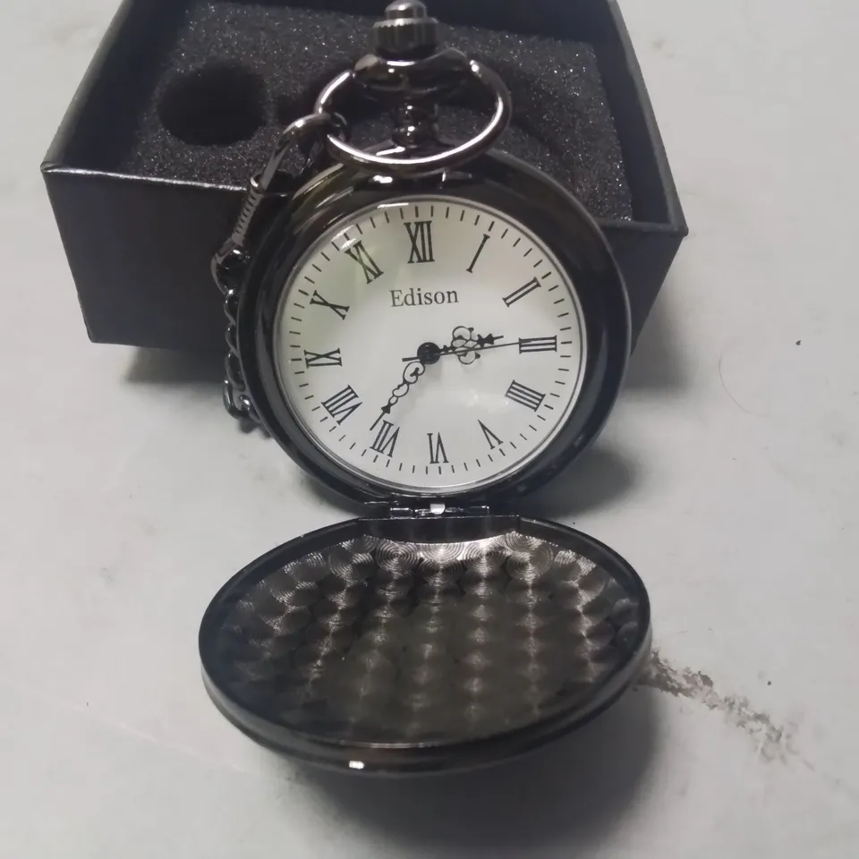 EDITION POCKET WATCH WITH WHITE FACES AND ROMAN NUMERALS