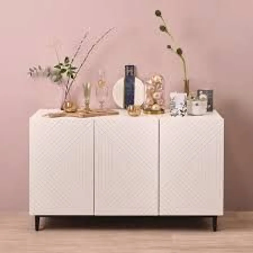 BOXED WHITE SIDEBOARD WITH GEOMETRIC DETAILS PUSH LOCK MECHANISM TO OPEN DOORS DIMENSIONS: HEIGHT 72.5CM, LENGTH 120CM, DEPTH 44CM DIMENSIONS OF CUPBOARDS: HEIGHT 60CM, LENGTH 38CM FEET HEIGHT: 11CM F