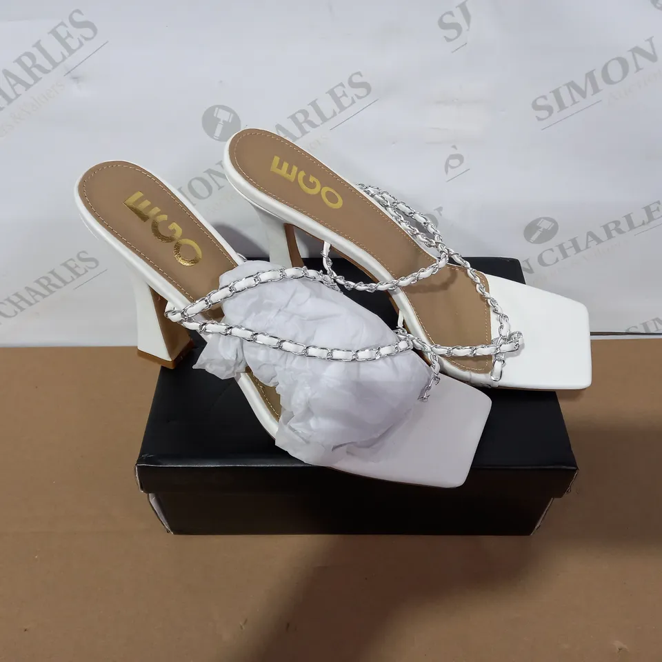 BOXED PAIR OF EGO WHITE HIGH HEELS SIZE 8