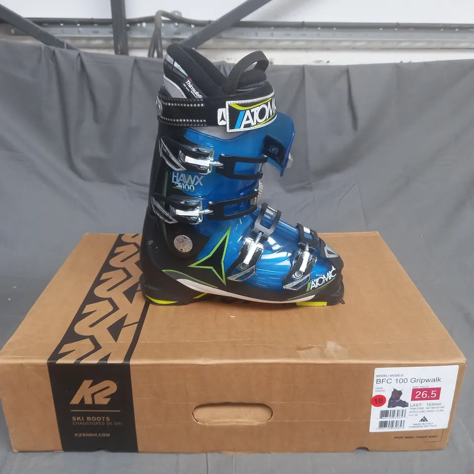 BOXED PAIR OF ATOMIC BCF 100 GRIPWALK SKI BOOTS IN BLUE/YELLOW SIZE 26.5